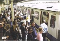 C1 Advanced Speaking - Many people getting on and of a subway train