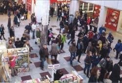 A busy shopping mall seen from above - B2 First Speaking Part 2