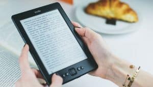 Reading a Kindle in a cafe - B2 First Speaking Part 2 Question Reading a Kindle in a cafe - B2 First Speaking Part 2 Question