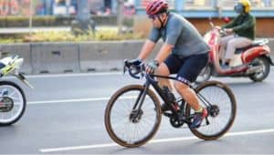 Why Might These People be Cycling? - Busy Street - B2 First Speaking Part 2 Question Why Might These People be Cycling? - Busy Street - B2 First Speaking Part 2 Question